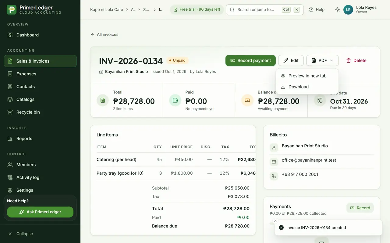 The saved invoice with its number, Unpaid status, totals, and the PDF menu open